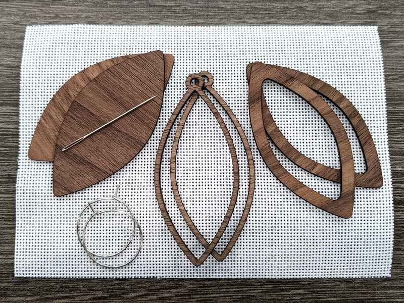 Kit contents for walnut Convergence needlework kit