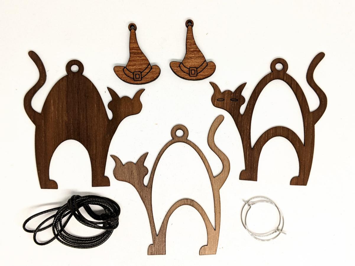 Kit contents for patchwork Halloween cat necklace with witch hat earrings